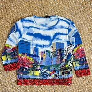 Vintage Y2K blue long sleeve top with a street art vibe